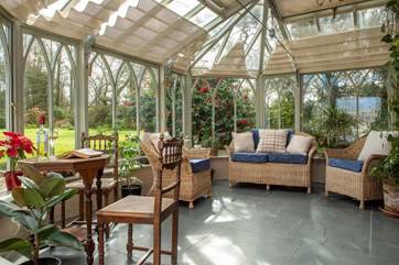 Enjoy tranquil views over the garden.