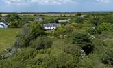 Traboe Cottage features a stunning mature garden, abundant shrubs, trees and foliage. - Thumbnail Image