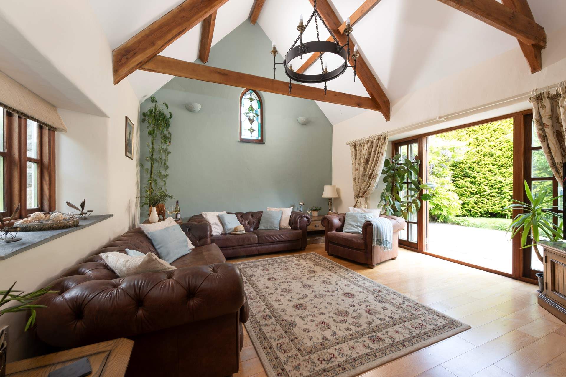 The sitting-room opens to the patio and is beautifully appointed.