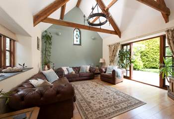 The sitting-room opens to the patio and is beautifully appointed.