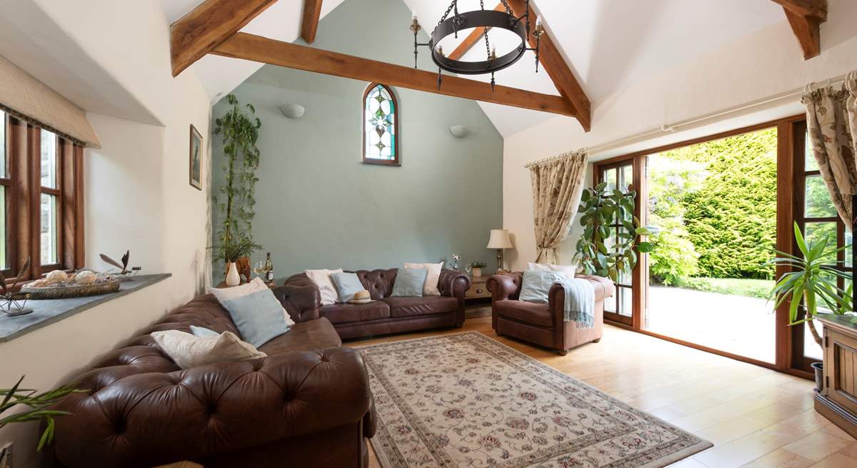 The sitting-room opens to the patio and is beautifully appointed.