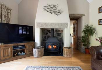 Cosy up next to the wood-burner on cooler evenings.