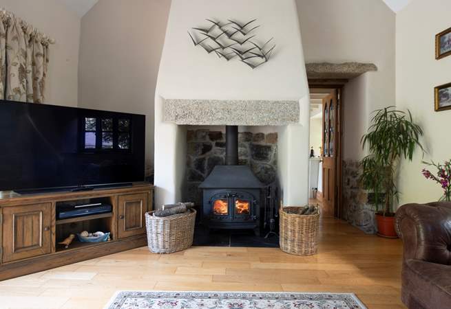 Cosy up next to the wood-burner on cooler evenings.