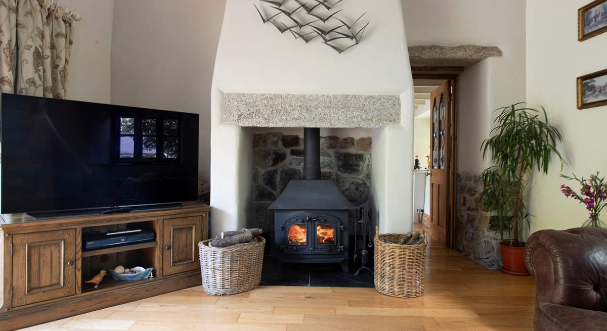 Cosy up next to the wood-burner on cooler evenings.
