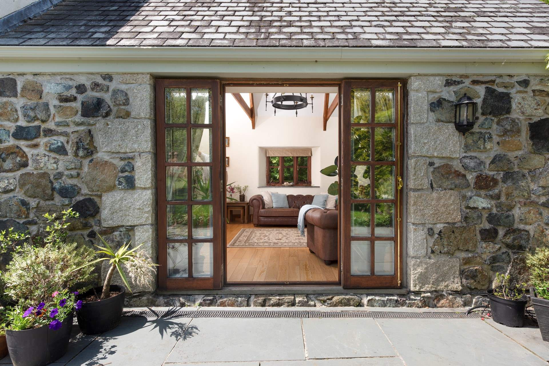 The sitting-room opens directly onto the large rear patio.