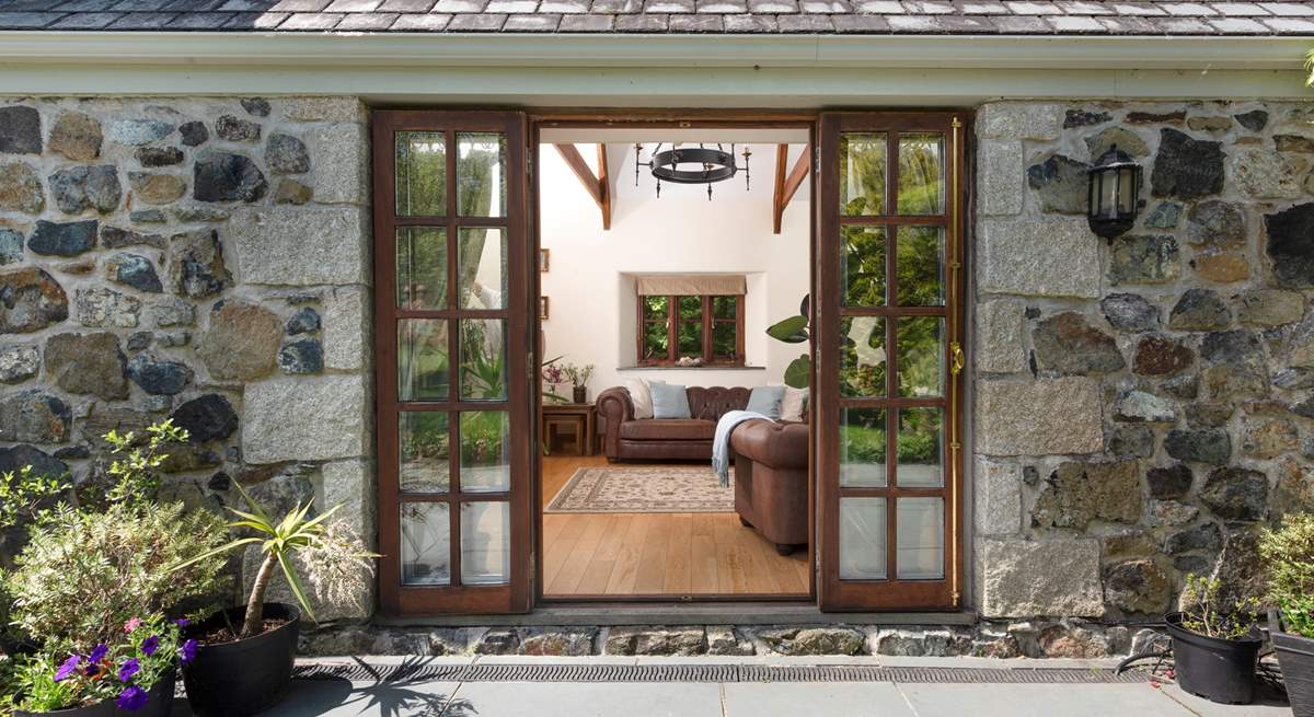 The sitting-room opens directly onto the large rear patio.