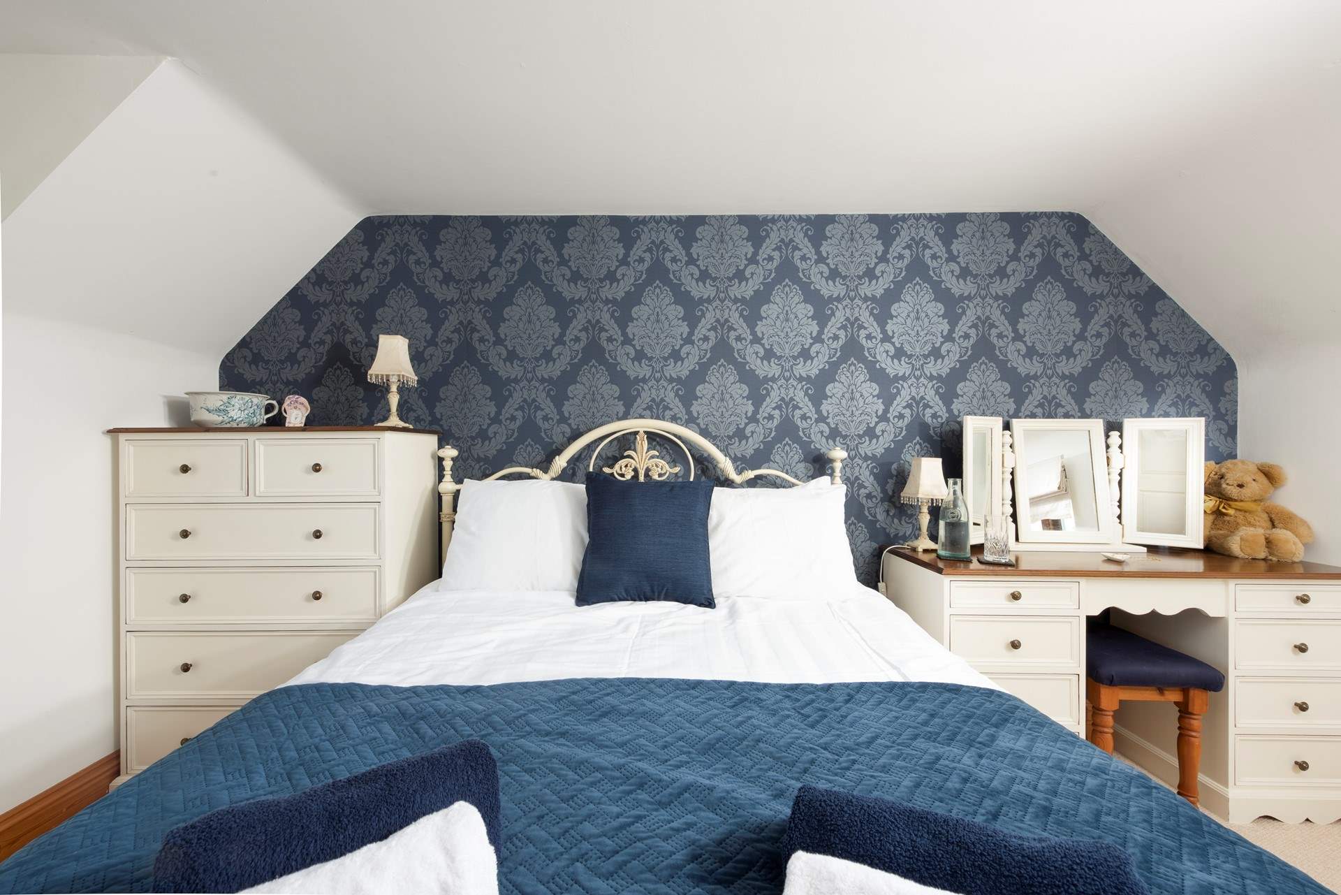 Another king-size room invites restful slumber.