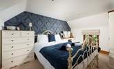Sapphire shades in this opulent bedroom. - Thumbnail Image