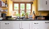 The kitchen boasts a sunny disposition. - Thumbnail Image