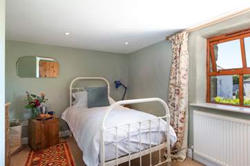 Fabulous decor and unique pieces can be found throughout the barn (Bedroom 3).