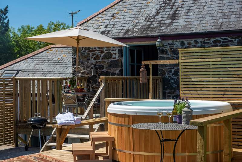 The hot tub is the perfect place to stargaze with a chilled glass of wine. 