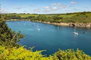 The tranquil banks of the Helford are a short drive away. 