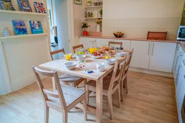 The kitchen links through to the utility-room and is situated at the back of the house. This breakfast table offers a great informal place for a relaxed breakfast.