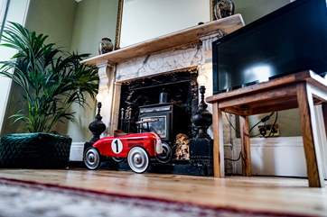 This fireplace is a real focal point, this wonderful car will be enjoyed by children and admired by the adults. A larger wall-mounted TV will be installed shortly.