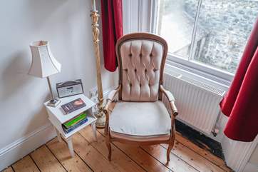 Bedroom 3, situated to the back of the house, has a lovely reading corner that has views of the courtyard and blue skies.
