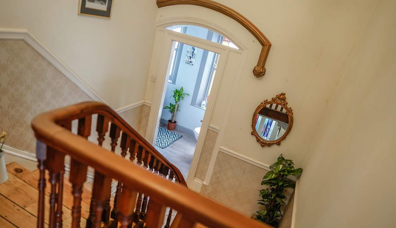 Looking down at the half-landing shower-room from the first floor.