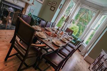 The dining-room is situated to the front of the house offering views of the garden through the grand sash windows.