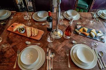 The grand dining-table offers a large space for everyone to enjoy a formal meal or even a celebration.