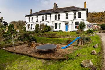 Rossmoyne (on the left) is a semi detached house on the outskirts of Dartmoor.