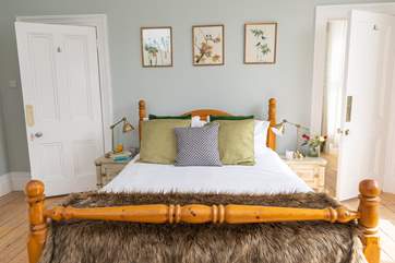 Bedroom 1 with a king size bed and en suite bathroom.
