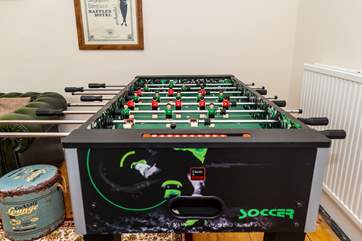 The study also doubles up as a games room, who doesn't love a competitive game of table football with the family.