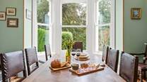 Gather everyone around the dining-table to chat about the day's adventures.
