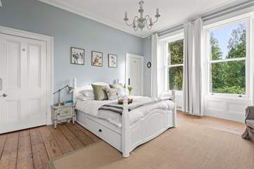 Bedroom 1 with a king size bed and en suite bathroom offers a beautifully styled en-suite bedroom.