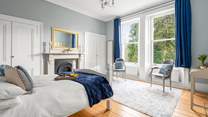 Bedroom 2 is situated to the front of the house, and offers a place to sit, read and enjoy the garden views. 