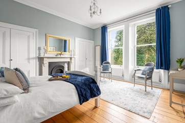 Bedroom 2 is situated to the front of the house, and offers a place to sit, read and enjoy the garden views.