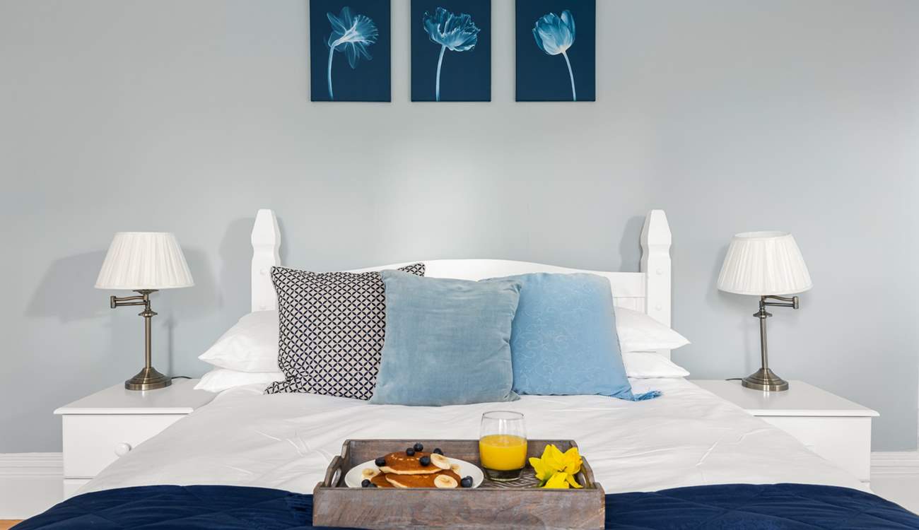 In the morning pull back the curtain and enjoy the view of the trees and skies whilst listening to the morning chorus from this glorious bed.