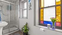 The shower-room is situated on the half-landing and offers a WC and wash-basin.