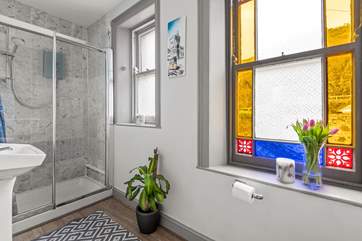 The shower-room is situated on the middle landing offering a WC and wash-basin.