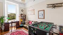 A game of table football will entertain everyone.