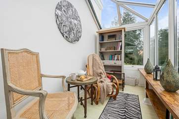 Accessed through the living room, the conservatory is definitely a room with a view!