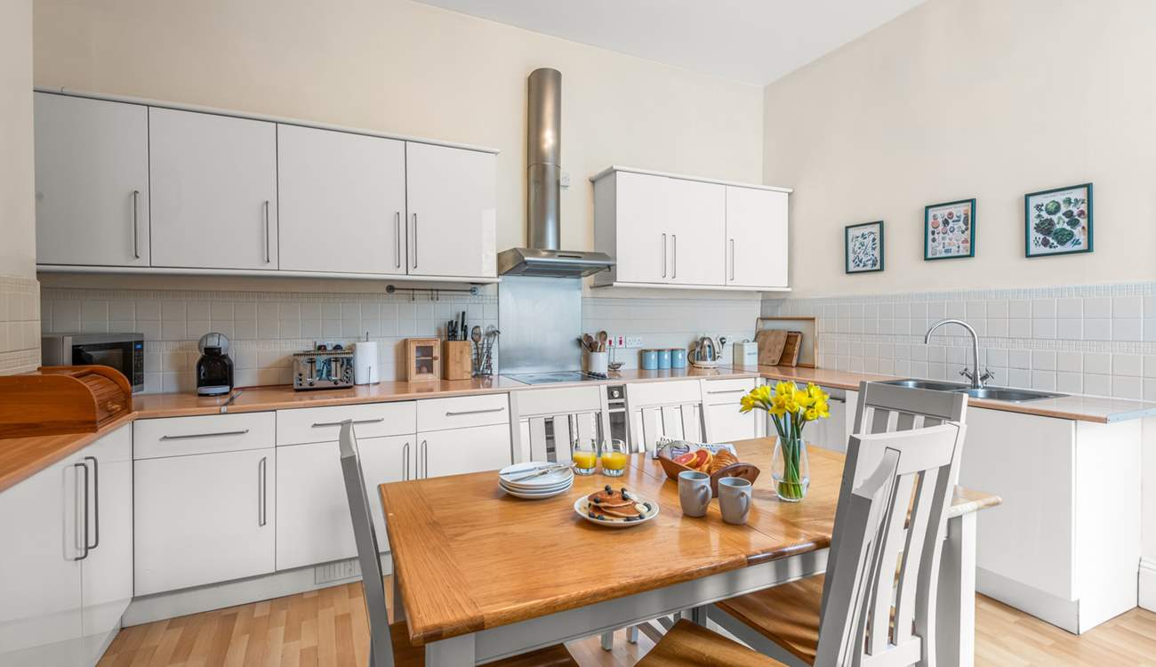 The kitchen is light and bright.