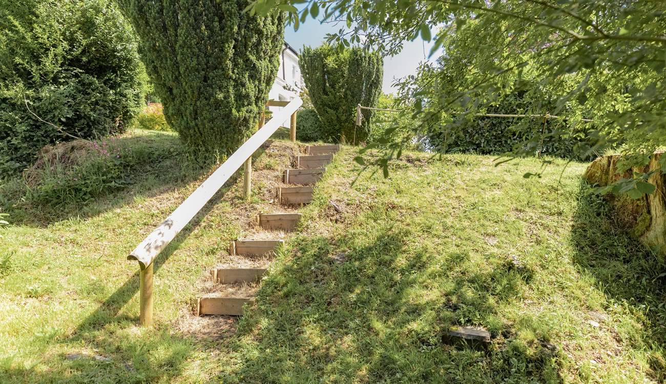 Head down to the garden and discover the little stream. 