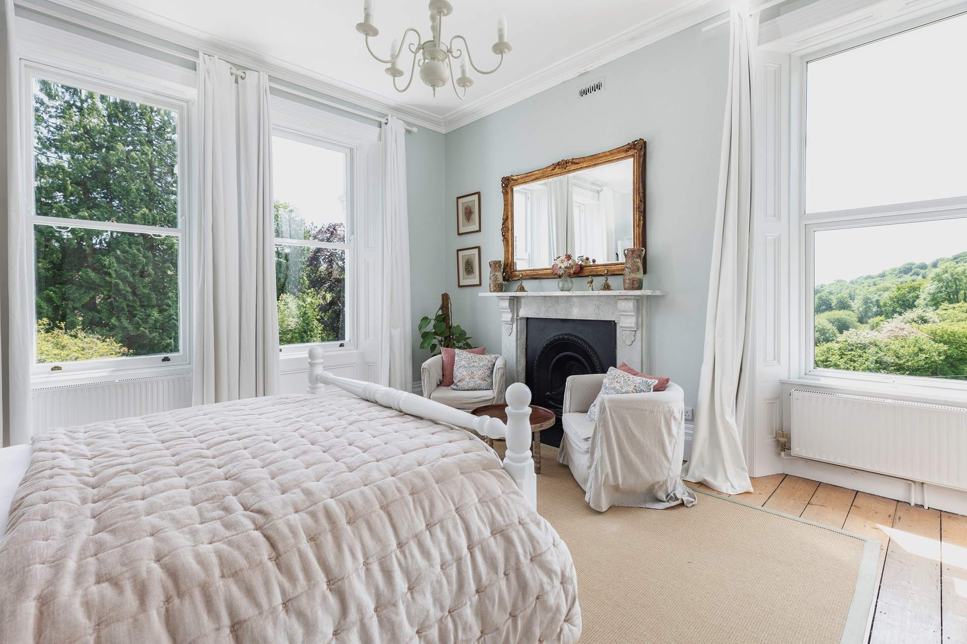 Bedroom 1 with a king-size bed and en suite bathroom offers fabulous views.