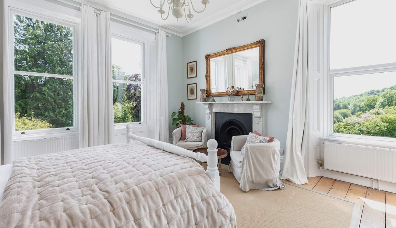 Bedroom 1 with a king-size bed and en suite bathroom offers fabulous views.