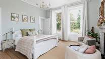 This bedroom is decorated in calming tones.