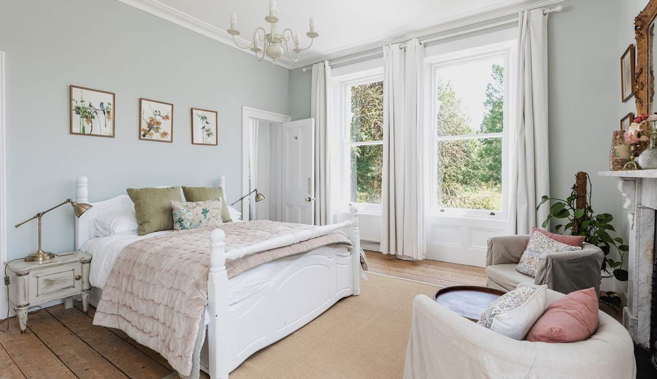 This bedroom is decorated in calming tones.