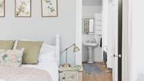 The en suite bedroom is styled for relaxation!
