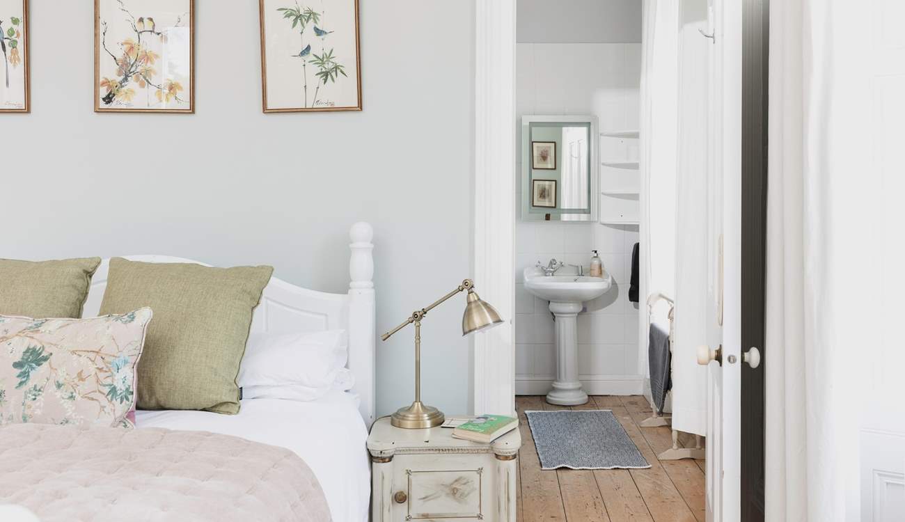 The en suite bedroom is styled for relaxation!
