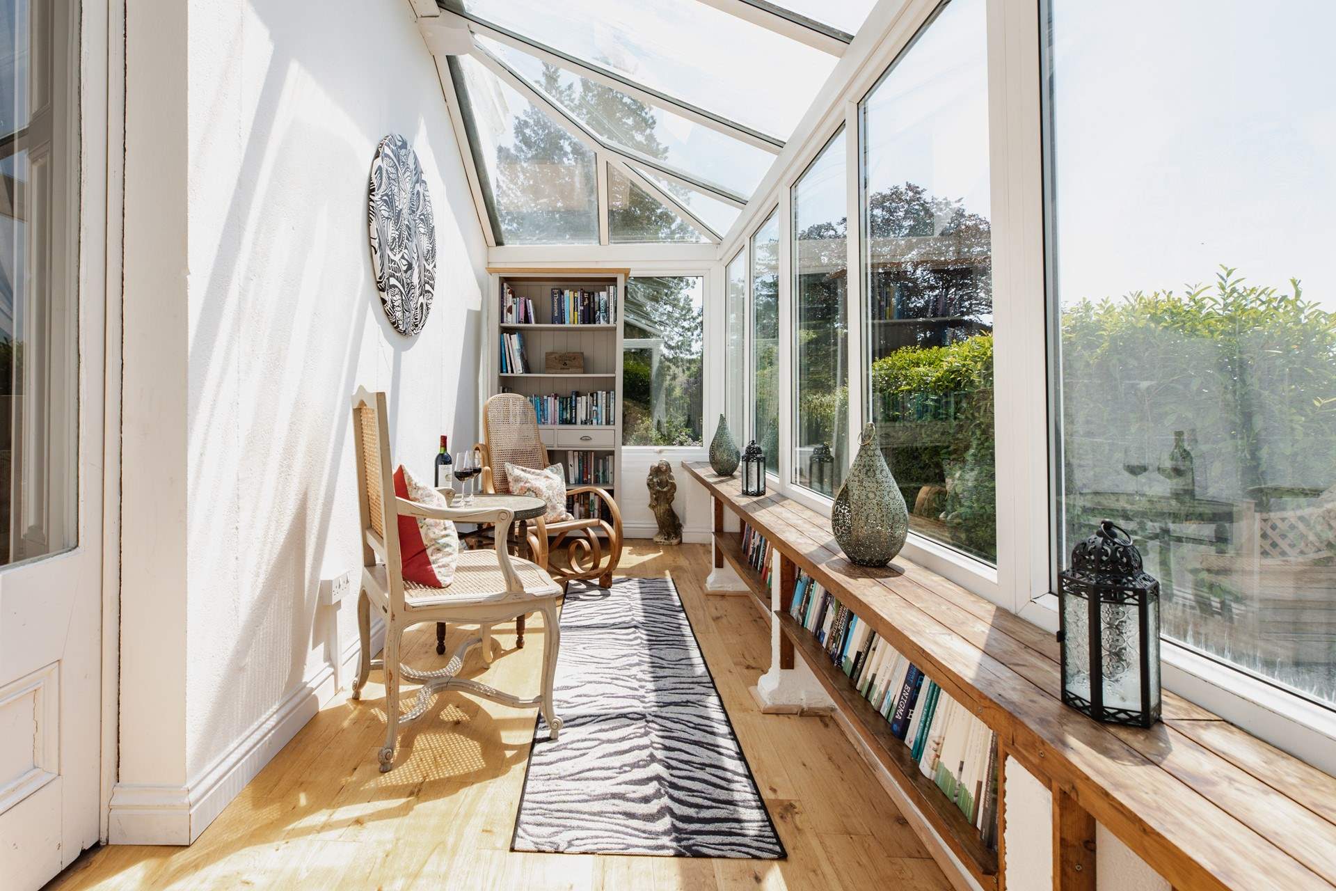 Accessed through the sitting-room, the conservatory is definitely a room with a view!