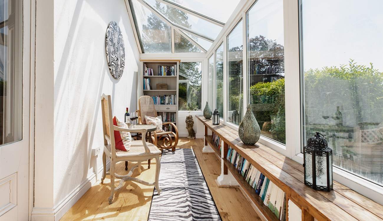 Accessed through the sitting-room, the conservatory is definitely a room with a view!
