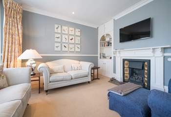 The sitting-room with coal-effect gas fire.