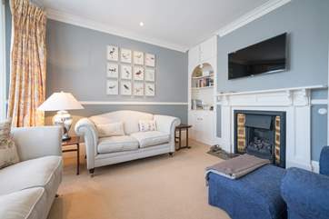 The sitting-room with coal-effect gas fire.