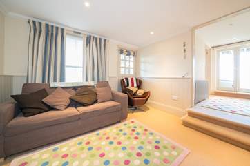 The play-room with TV and DVD player on the lower ground floor is the perfect place for the children to enjoy.