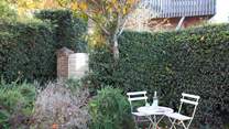 There is outside seating to the front of the property. 