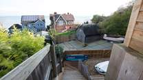 Please supervise young children when outside as the garden is on three levels, with steps at the bottom of the garden.