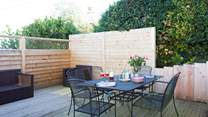 Dine al fresco while admiring the beautiful surroundings. 